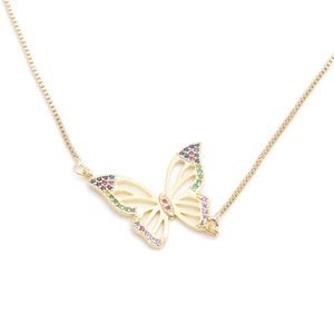 Detailed close-up of golden butterfly pendant necklace with colorful inlaid crystals