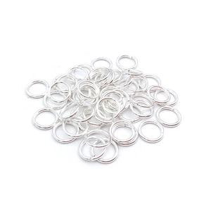 Macro shot of silver metal open jump rings for DIY jewelry making accessories