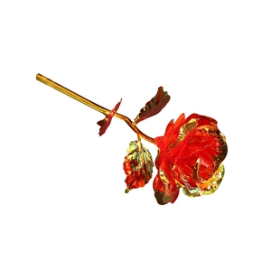 24k gold foil rose flower with red petals and golden stem on a white background