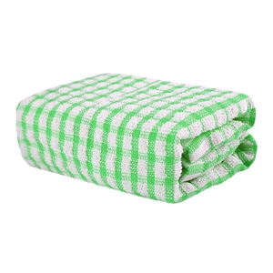 Folded green and white checkered cotton tea towel with absorbent texture on white background