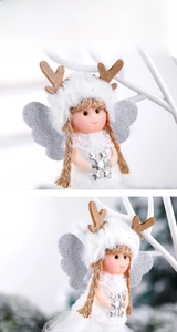 Detail of plush Christmas angel ornament with silver wings and reindeer antlers