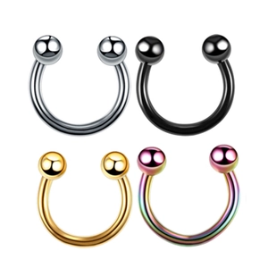 Close-up of four U-shaped stainless steel nose rings in silver, black, gold, and rainbow