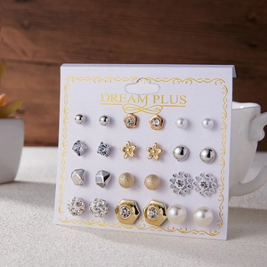 Detailed set of 12 pairs of gold and silver alloy earrings with pearls and crystals