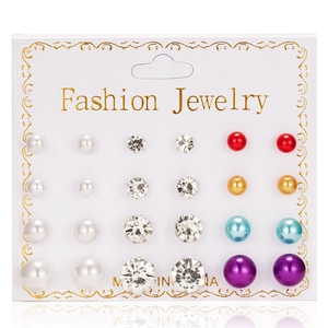 Detailed set of 12 pairs of colorful pearl and crystal stud earrings on jewelry card