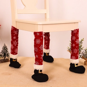 Christmas chair leg covers with red fabric snowflake pattern and black boot design set of 4