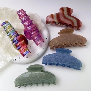 Set of 6 glittery Y2K shark hair clips in various gradient colors for women