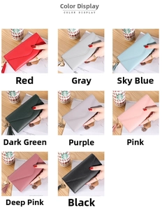 Close-up of long envelope wallets with heart tassel charms in eight vibrant colors