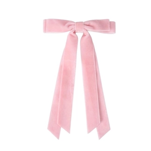Detail of pink velvet double-layered bow hair clip with long ribbons for girls