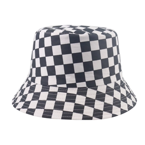 Close-up of the black and white checkerboard pattern on the canvas bucket hat
