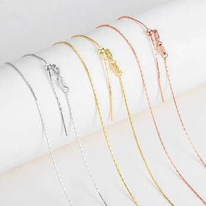 Detail of S925 sterling silver chains with ITALY stamp in gold, silver, and rose gold finishes