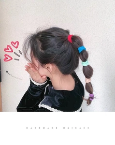 Colorful high-elastic seamless hair ties shown in a stylish lantern braid hairstyle