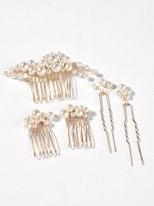 Detailed set of golden bridal hair pins and combs with white baroque pearls