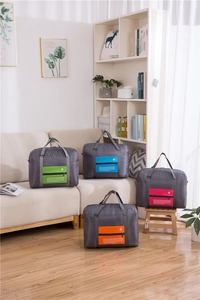 Collapsible large travel storage bags in four colors with airplane icon design
