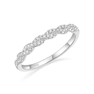 Macro view of S925 sterling silver scalloped wedding ring with shimmering pavé zircon stones