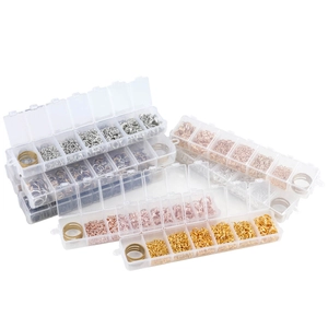 DIY jewelry making kit featuring assorted metal jump rings in a clear storage box