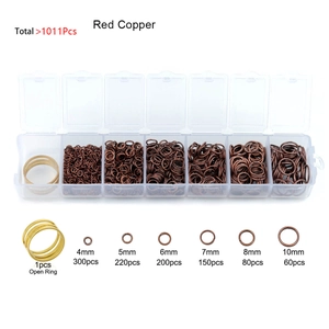 Macro detail of red copper open jump rings kit in multiple sizes for DIY jewelry making