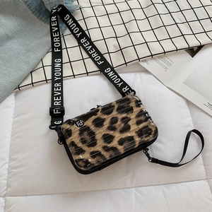 Mini luggage shaped crossbody bag with leopard print and wide Forever Young strap
