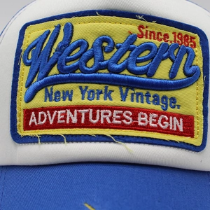 Close-up of premium embroidery on retro baseball cap with Western patch and stitch detail