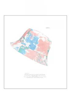 Close-up of colorful tie-dye bucket hat with pink and blue pastel cotton fabric details