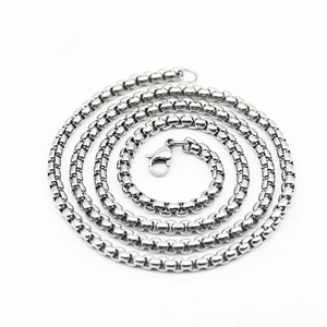 Detailed view of silver stainless steel box chain necklace with secure lobster clasp