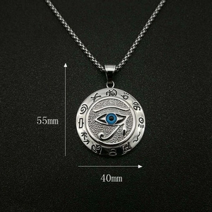 Detail of Eye of Horus pendant with blue eye inlay showing 55mm height and 40mm width