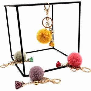 Creative fluffy pom-pom keychain with tassel and golden metal ring for bags and keys