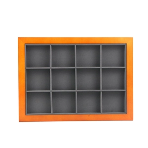 12-grid wooden jewelry display tray with orange wood frame and dark grey velvet lining