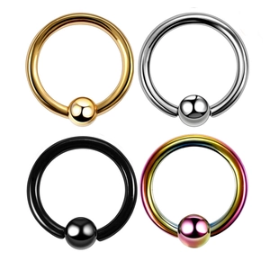 Set of four stainless steel captive bead rings in gold, silver, black, and rainbow colors