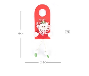 Detailed view of knitted Santa door hanger showing 45cm x 13.5cm dimensions