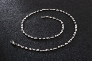 Detailed close-up of 304 stainless steel chain necklace with fine spiral curb links