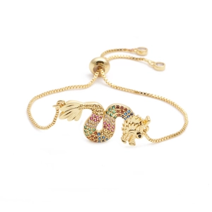 Gold dragon bracelet with colorful cubic zirconia and adjustable chain on white background