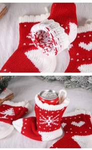 Detail of red and white knitted Christmas stocking with snowflake and tree patterns