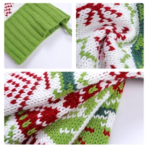 Classic red, green, and white knitted Christmas stocking with intricate textured weave pattern