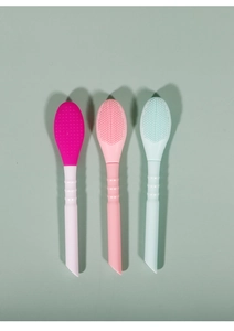 Detail of dual-sided silicone face mask brushes with textured bristles for deep cleaning