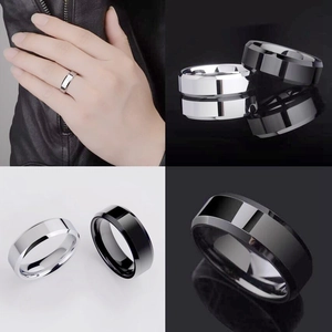 Detailed views of silver and black titanium steel rings with polished bevel edges