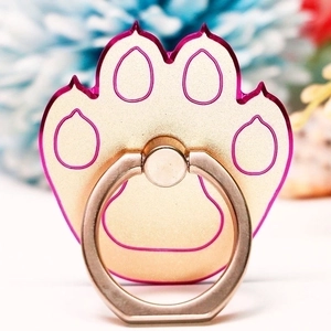 Pink animal paw metal phone ring holder and kickstand with a glossy gold finish