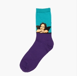 Detail of blue and purple knit socks featuring Raphael's pixelated cherub art design