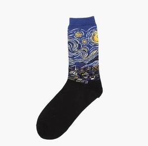 Close-up of artistic socks featuring Van Gogh's Starry Night oil painting pattern