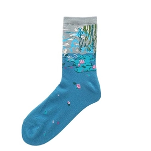 Close-up of crew sock featuring blue impressionist oil painting art and grey ribbed cuff