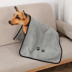 Absorbent microfiber pet towel in dark grey with black paw prints for dogs and cats