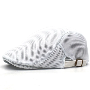 Detail of white mesh beret cap showing breathable fabric and metal adjustment buckle