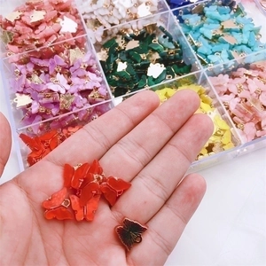 Colorful acrylic butterfly pendants for DIY jewelry making in multiple vibrant shades