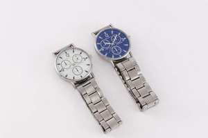 Detail view of MEYKEYS chronograph watches with blue and white dials on steel bands