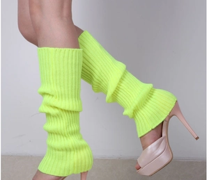Neon green ribbed knit leg warmers shown with platform heels for winter fashion