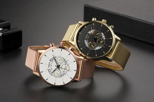 Detail of Geneva quartz watches with Milanese mesh bands in rose gold and black finish