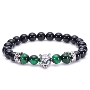 Tiger eye and black onyx beaded bracelet with silver wolf head and crown charms