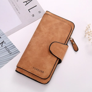 Detailed side view of a brown long trifold wallet featuring textured matte leather finish
