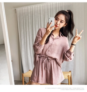 Detailed texture of dusty pink cotton linen shirt and high waist drawstring shorts set