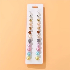 12-pair colorful pearl stud earrings set featuring monthly birthstone colors on card