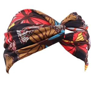 Bohemian elastic criss-cross sports headband with vibrant butterfly wing print